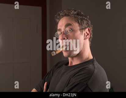 Young man with cigar, portrait Stock Photo