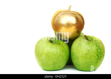 gold and green apples on white background Stock Photo