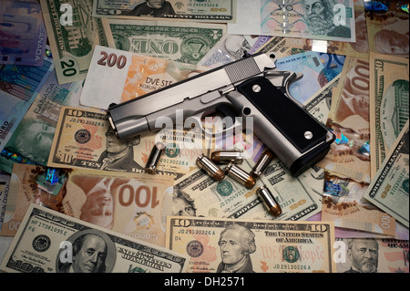 Pistol - Gun and money Stock Photo