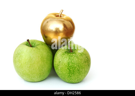 gold and green apples on white background Stock Photo