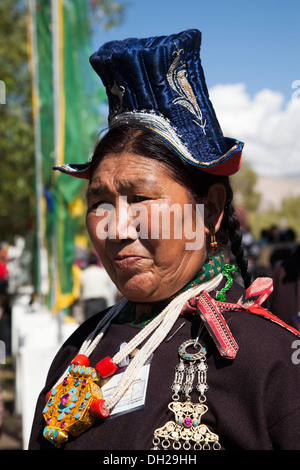 A woman in traditional dress awaits a bridegroom. Sumar, Nubra