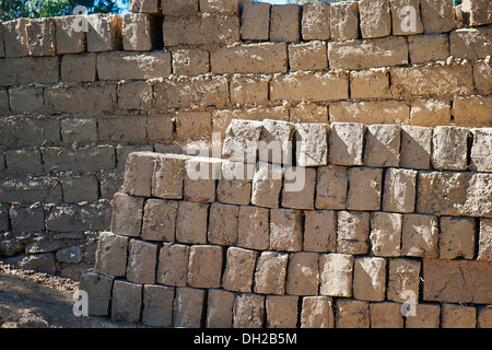 Adobe bricks drying in the sun at a rural settlement in the Peruvian Andes, South America. Stock Photo