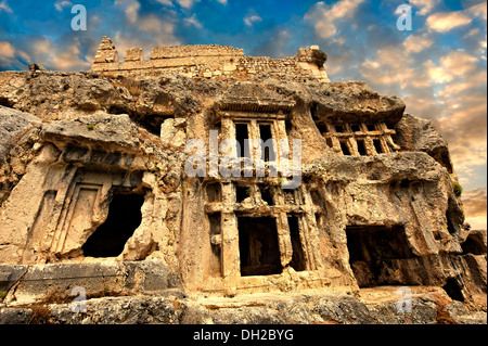 Tlos acropolis and Lycian house and temple-type rock-cut tombs. Tlos, Turkey Stock Photo