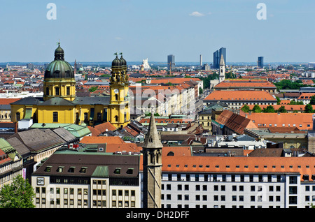 View over the roofs of Munich as seen from the steeple of the Church of St. Peter, Theatinerkirche church on the left, Munich Stock Photo