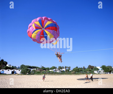 Parascending on Hammament Beach, Hammamet, Nabeul Governorate, Tunisia Stock Photo