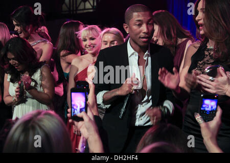 New York, New York, USA. 29th Oct, 2013. New York, NY October 30, 2013 : Pharrell Williams performs at The 2013 Gabrielle Angel's Foundation Angel Ball at Cipriani Wall Street on October 29, 2013 in New York, NY © Rahav Segev/ZUMAPRESS.com/Alamy Live News Stock Photo