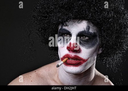 Evil Spooky Clown Portrait on Black Background