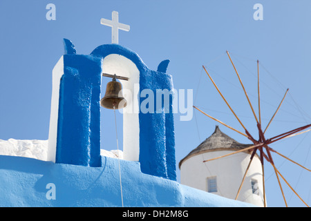 windmill and a cross with a bell, Santorini Stock Photo