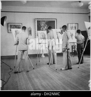 The image shows students participating in an art class at Xavier University. The photo captures an educational setting where students engage in creative activities, developing their artistic skills. Stock Photo
