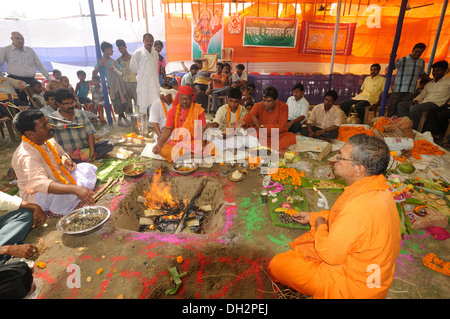 havan yagya fire ceremony by political party BJP candidate at Uluberia Howrah west bengal india asia Stock Photo