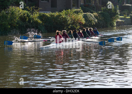 Cambridge, UK. 30th Oct, 2013. Rowers on the River Cam in early morning light Cambridge UK 30th October 2013. After a cold night with one of the first frosts of the year Cambridge basks in glorious autumn sunshine. Credit Julian Eales/ Alamy Live News Stock Photo