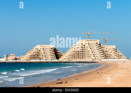 New residential apartment buildings under construction on Al Marjan Island in Ras al Khaimah United Arab Emirates UAE Stock Photo