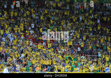 Local Brazil fans in the stadium. Brazil v Japan, FIFA Confederations Cup, Group match, Mane Garrincha national Stadium, Brasili Stock Photo