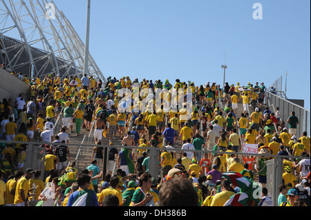 Local Brazilian fans arriving at the stadium. Stock Photo