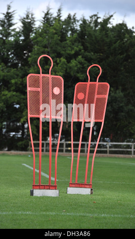 Two football mannequins for use in training Stock Photo