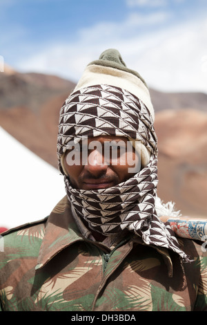 Indian road worker involved in construction of Leh, Manali road, Moor Plain, Ladakh, Northern India Stock Photo