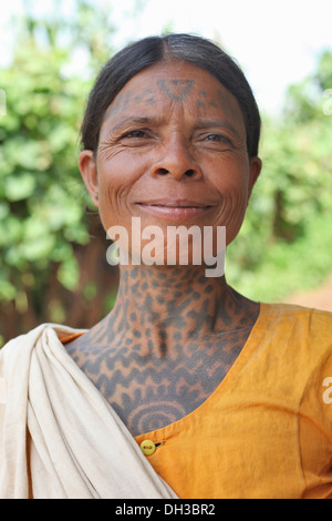 Woman with tattoo on her face and throat. Baiga Tribe, Chada village, Madhya Pradesh, India Stock Photo