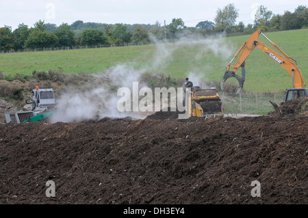 Commercial mulching operation at Laverstoke Park Farm, Hants, UK Stock Photo