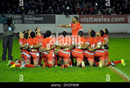 Workington, Cumbria, UK. 29th October 2013. The Tonga team do their version of the hakka, called the Sipi Tau - Tonga v Scotland - Group C - Rugby League World Cup 2013 - Derwent Stadium, Workington, England. 29/10/2013 © Sport In Pictures/Alamy Live News Stock Photo