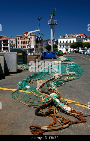 Fishing nets in the fishing port of Saint-Jean-de-Luz, in Basque: Donibane Lohizune, Pyrenees, Aquitaine region, Stock Photo