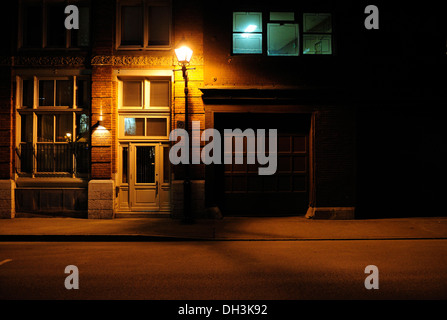 Atmospherically lit front in the historic old town of Montreal, Quebec, Canada Stock Photo