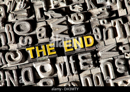 Old lead letters forming the English words 'THE END' Stock Photo