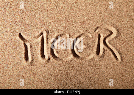 Writing in the sand "MEER" or "SEA" Stock Photo