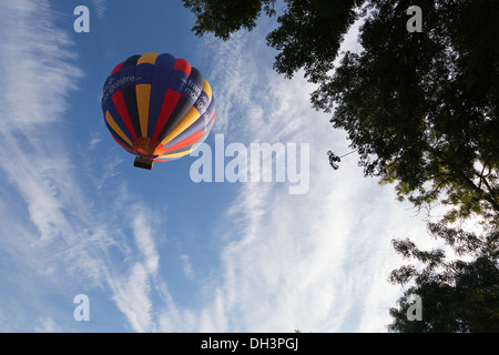 Hot air balloons in the Loire Valley near Chateau Chenonceau, France 2013. Flying over Le Cher river. Stock Photo