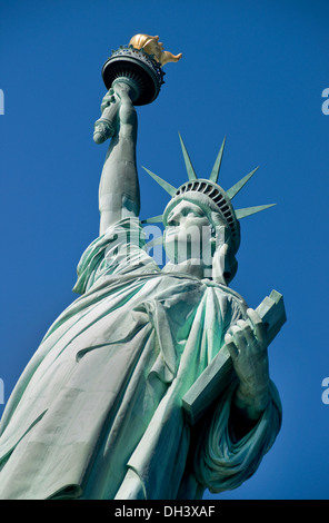 Statue of Liberty on Hudson River in NYC. Stock Photo