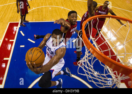 October 30, 2013: Philadelphia 76ers small forward Thaddeus Young (21) goes up for the shot with Miami Heat power forward Udonis Haslem (40) reaching from behind during the NBA game between the Miami Heat and the Philadelphia 76ers at the Wells Fargo Center in Philadelphia, Pennsylvania. The 76ers win 114-110. Christopher Szagola/Cal Sport Media Stock Photo