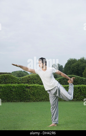 Man exercising in a park Stock Photo