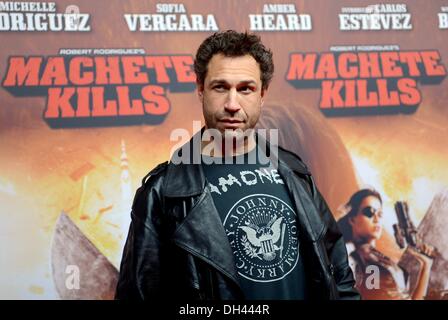 Berlin, Germany. 30th Oct, 2013. US bassist of the band Bloodhound Gang, 'Evil' Jared Hasselhoff poses prior the premiere of the movie 'Machete Kills' in Berlin, Germany, 30 October 2013. The film will be released across German cinemas on 19 December. Photo: Britta Pedersen/dpa/Alamy Live News Stock Photo