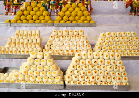 Indian Sweets peda mithai display made of milk Khowa for sale in shop Ramdeora Rajasthan India Asia Stock Photo