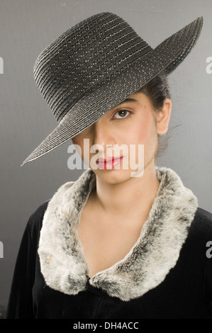 woman in fur collar coat and hat Stock Photo