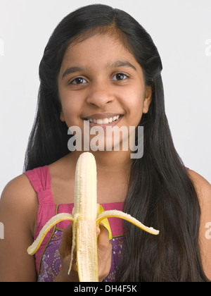 Girl Eating Banana MR#477 Stock Photo