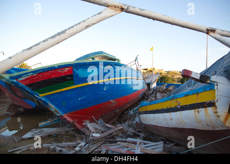 African fishing vessels seized by the Italian Coastguards, captured from African refugees trying to land in Lampedusa, Italy Stock Photo