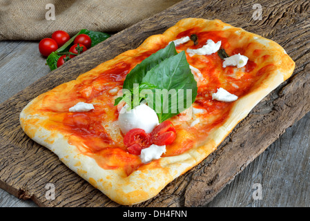 homemade pizza and baked in the wood oven Stock Photo