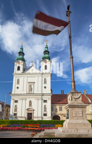Dominican Church and Flag of Loyalty in Szechenyi Square, Sopron, Western Transdanubia, Hungary Stock Photo