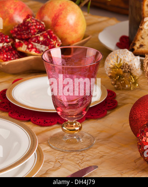 Detail of a glass of Murano in a Christmas table. Stock Photo