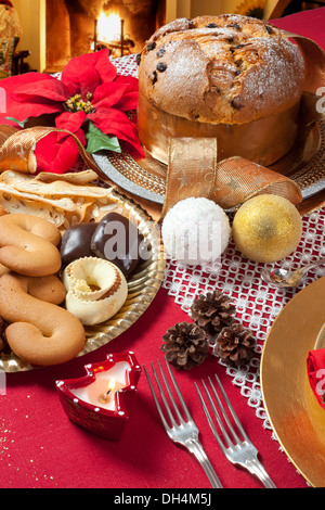 Decorated Christmas Dinner Table with studio lighting Stock Photo