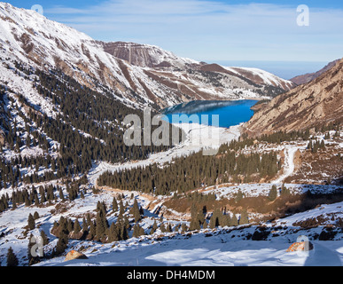 Mirror of mountain soul - emerald mountain lake. Tien-Shan mountains. Stock Photo