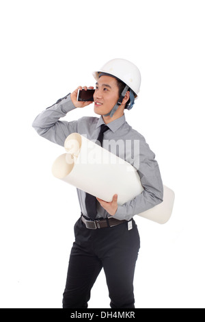 Architect holding blueprints Stock Photo