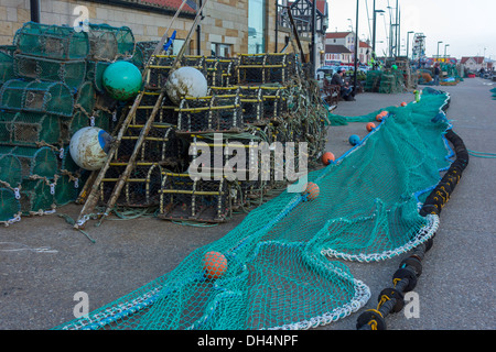 Commercial fishing nets laid out to dry  by the Harbour in Scarborough North Yorkshire England UK Stock Photo