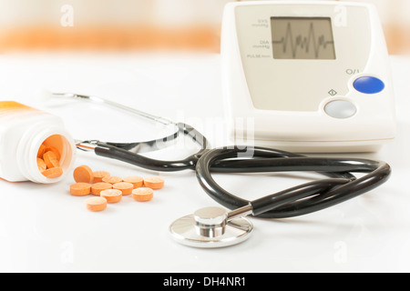 stethoscope and medications in pill form Stock Photo