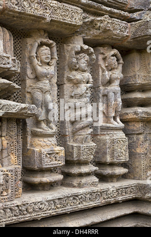 Carved Sculptures of dancers on wall, Konark Sun Temple, Orissa India. UNESCO world heritage site Stock Photo