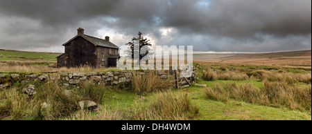 A derelict and abandoned farmhouse at Nun's Cross a remote part of Dartmoor National Park near Princetown in Devon Stock Photo