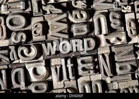 Old lead letters forming the word WORD Stock Photo