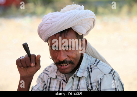 Close Up Of A Bhil Tribal Man Smoking A Smoking Bidi, Indian Handmade 