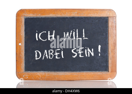Old school blackboard with the words ICH WILL DABEI SEIN, German for I want to be a part of it Stock Photo