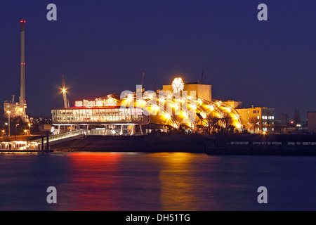 Theatre for the musical 'The Lion King', at night in the free port of Hamburg on the Elbe River, Hamburg Stock Photo
